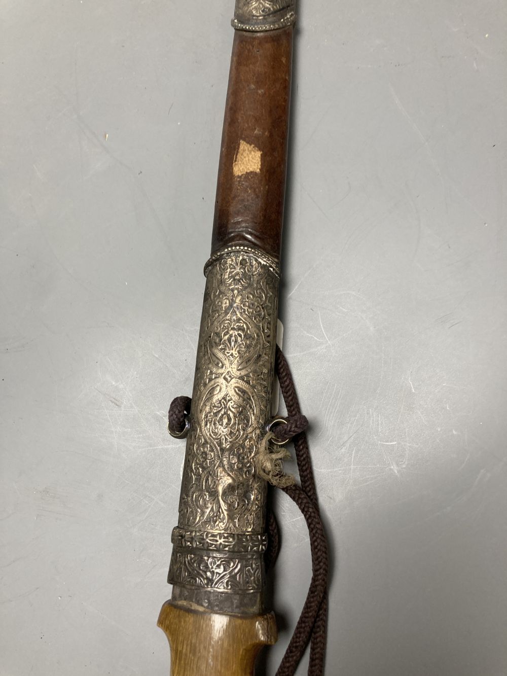 A late 19th century Moroccan rhino horn handled dagger, 57cm